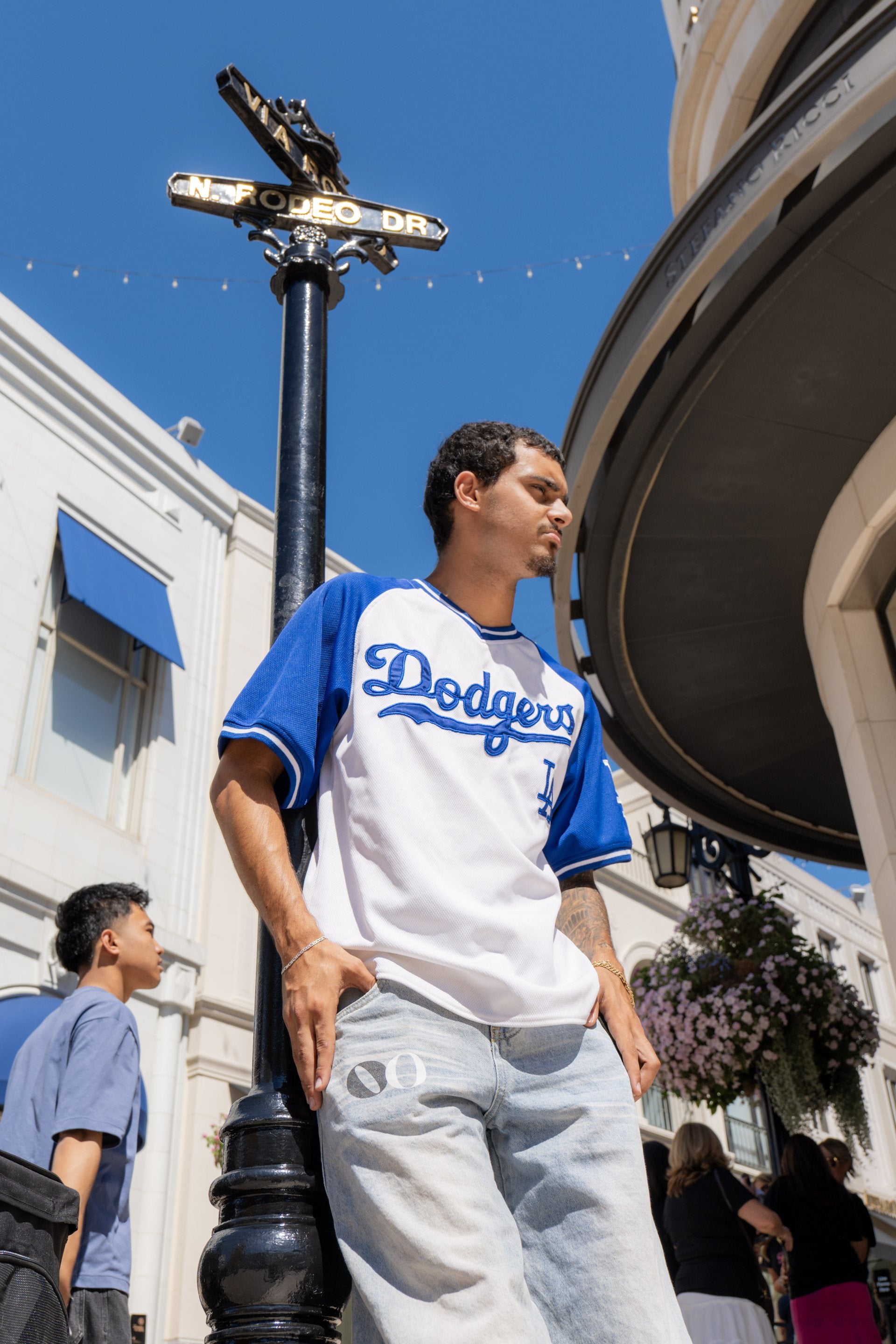 Beneath the N. Rodeo Dr street sign in Wilomina denim, Beverly Hills